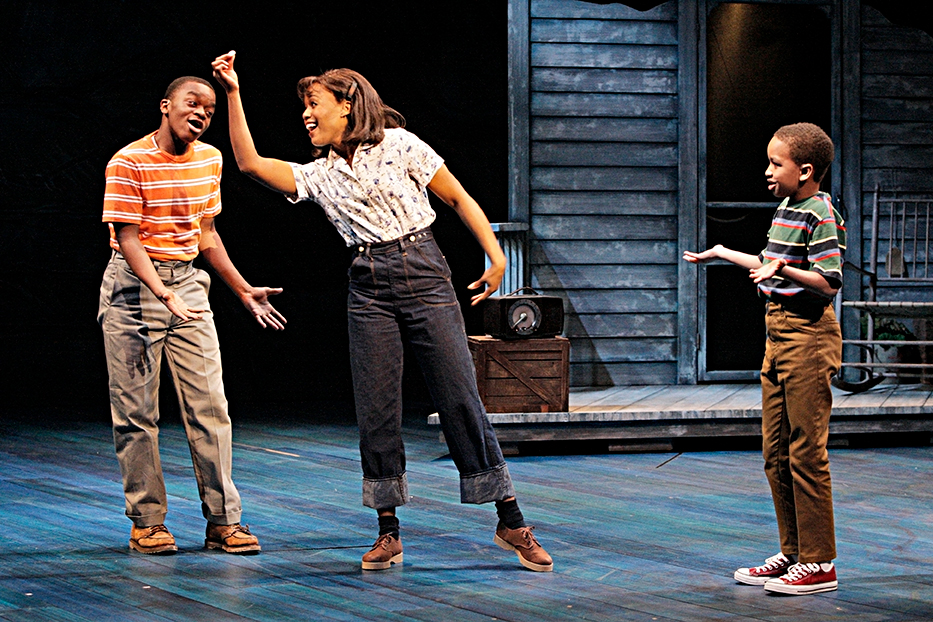 Jackson M. Hurst as Jackie Thibodeaux, Nikki Renée Daniels as Emmie Thibodeaux and Zadir King as Joe Thibodeaux in Caroline, or Change at the GuthrieTheatre. Photo by Michal Daniel.