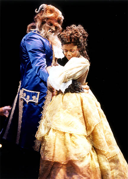 Nikki Renée Daniels as Belle with Brad Little as the Beast in Beauty and the Beast at North Shore Music Theatre. Photo by Paul Lyden.