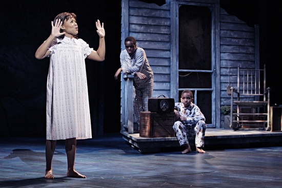 Nikki Renée Daniels as Emmie Thibodeaux with Jackson M. Hurst as Jackie Thibodeaux and Zadir King as Joe Thibodeaux in Caroline, or Change at the GuthrieTheatre. Photo by Michal Daniel.